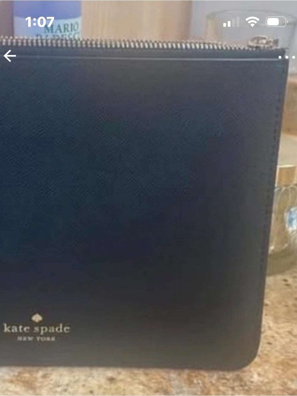 kate spade black leather toiletry pouch with gold zipper